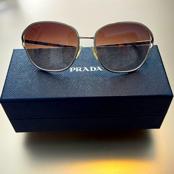 Prada sunglasses, tortoise arms with gold Prada logo. One size. - Picture 1 of 3